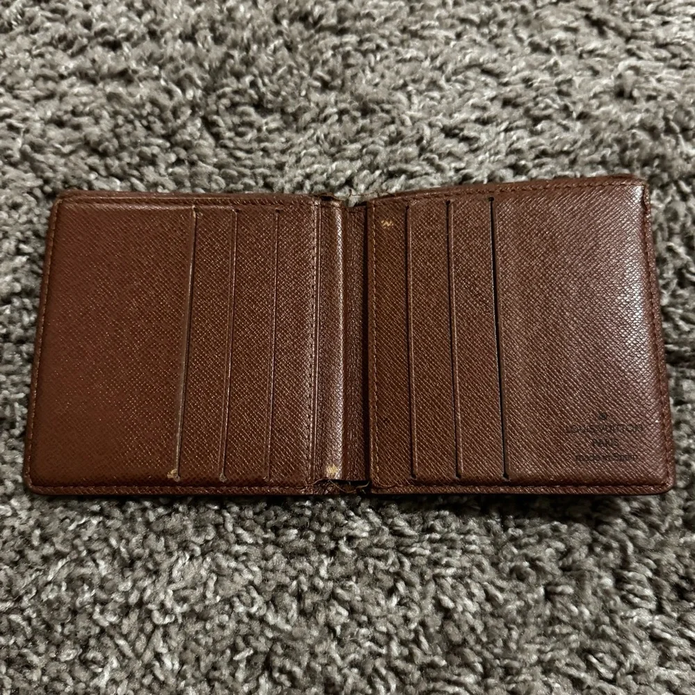 Louis Vuitton Bi fold Brown Wallet